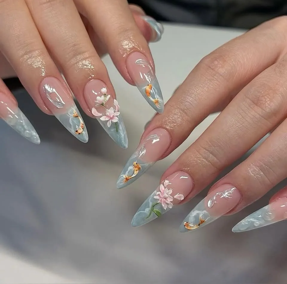 koi fish and blossoms by Layla